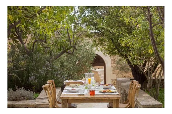 Kapsaliana Village Hotel garden dining terrace