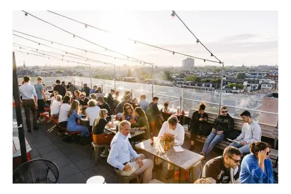 Volkshotel, Guests drinking on rooftop