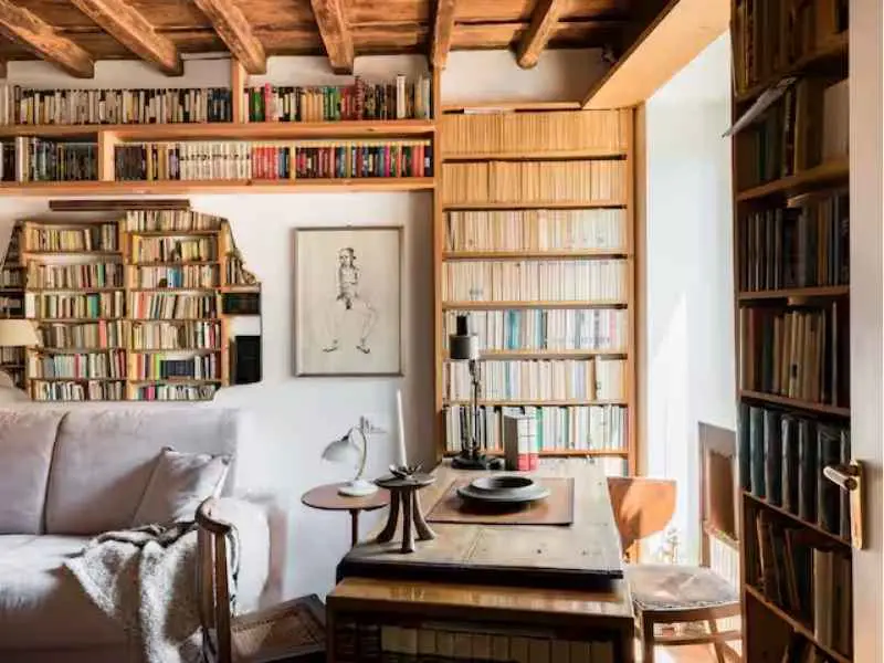 Book & Art-Filled Apartment, Living room with bookshelf, Rome 