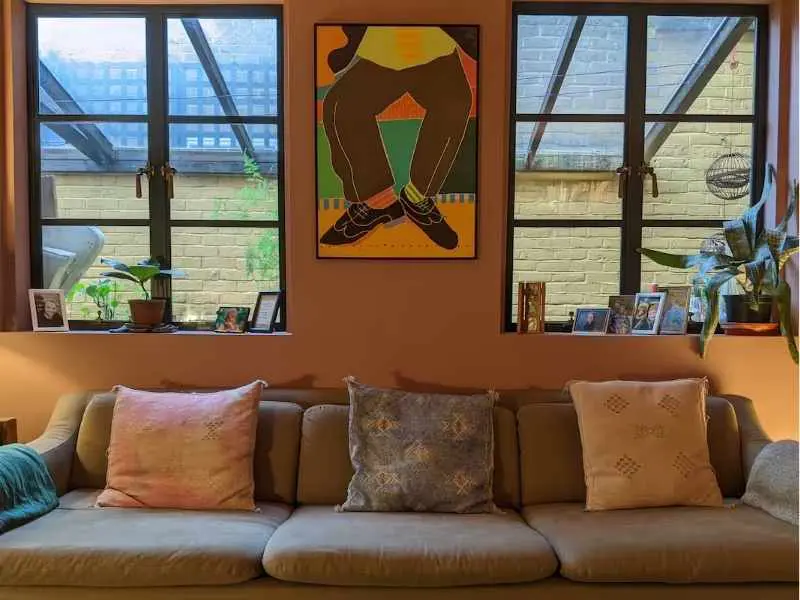 Stylish 1 bed with large plant filled garden, Living room with Artwork 