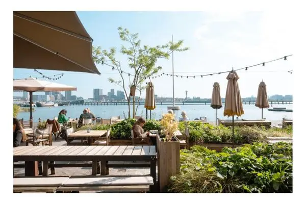 The July Boat & Co, outdoor terrace with view of water