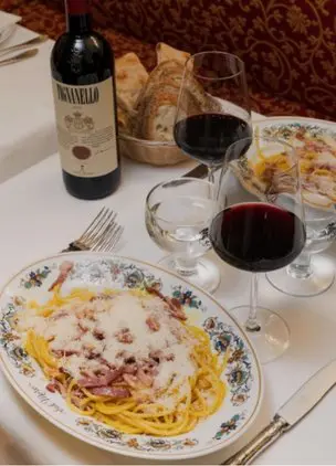 Traditional Roman pasta and red wine at Trattoria al Moro, one of the classic restaurants in Centro Storico Rome