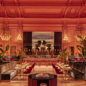 Casa de las Artes, Interior shot of the Bar with high ceilings and red walls, Madrid