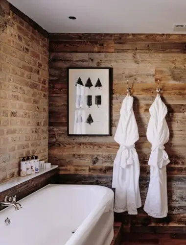 Bathroom at Artist Residence Pimlico London with reclaimed brick wall