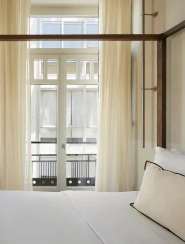 Minimal guest room at Ergon Bakehouse, a design-led hotel in central Athens