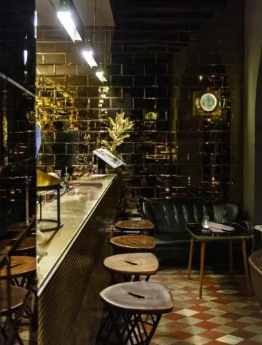 Atmospheric cocktail bar at G-Rough, a design-led boutique hotel in the heart of Rome