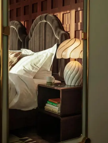 Stylish guest room at The Hoxton Rome, a design-led hotel in Rome’s Parioli neighbourhood