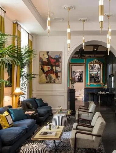 Elegant lounge at Hotel Vilòn overlooking one of Rome’s most exclusive private gardens