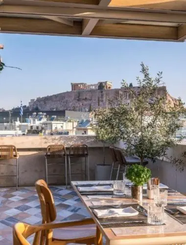 Rooftop restaurant terrace at Niche Hotel Athens overlooking the Acropolis
