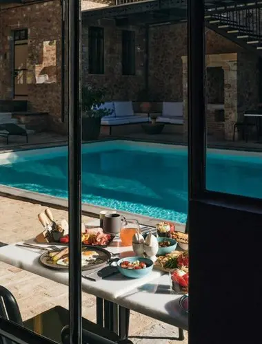 Poolside courtyard at NOT Hotel, one of the most distinctive hotels in Koukaki Athens