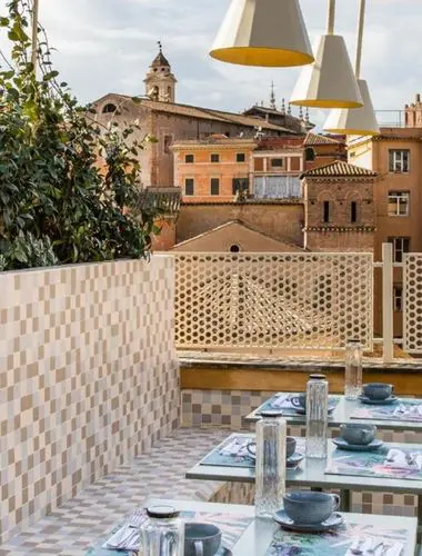 Rooftop terrace at Condominio Monti with views across the historic Monti district