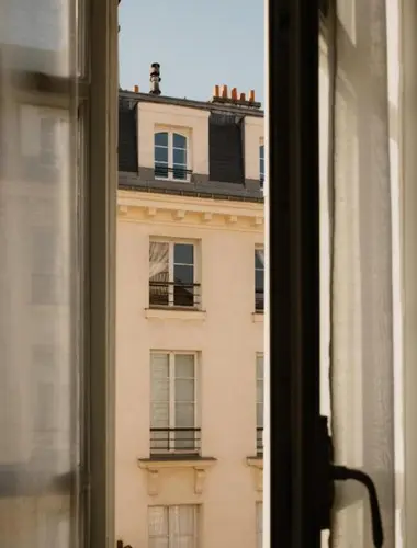 Hôtel Bourgogne & Montana room view over Paris Left Bank streetscape