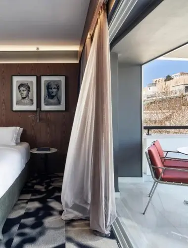Private balcony with Acropolis views at AthensWas, one of the best hotels with Acropolis views in Athens