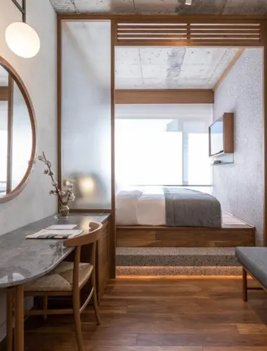 Contemporary guest room at Ergon House Athens, a food-focused hotel near the Acropolis