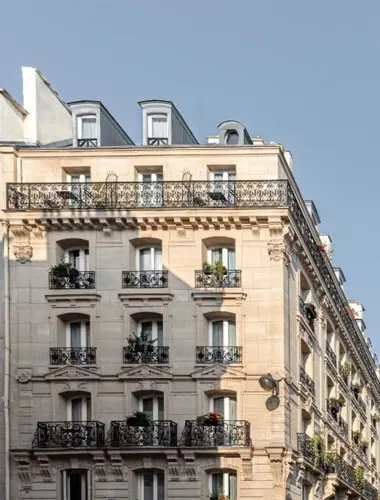 Grand Pigalle Experimental hotel facade with balconies in Paris
