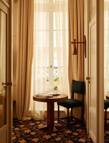 Château Voltaire guest room with Parisian interiors at a romantic hotel in Paris