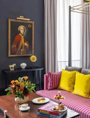 Refined sitting area at Palazzo Roma combining aristocratic Roman heritage with contemporary comfort